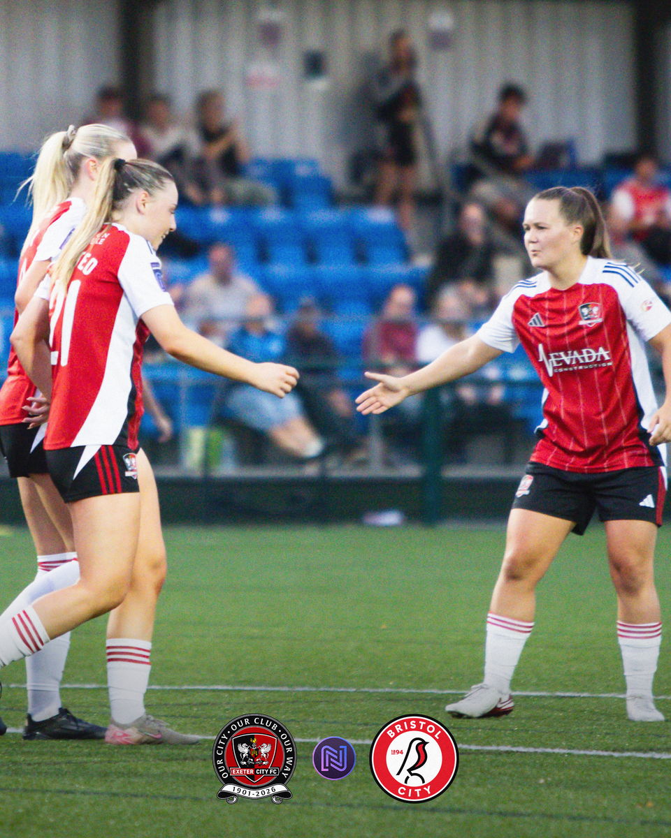 Image of Phoebe Baker high fiving Darcey Maxted to celebrate her goal