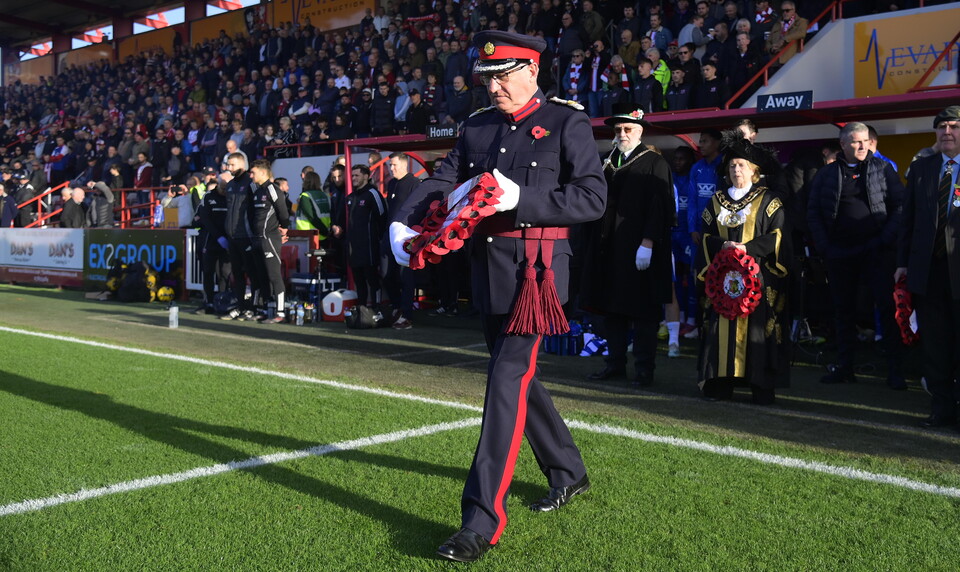 A wreath being laid at St James Park