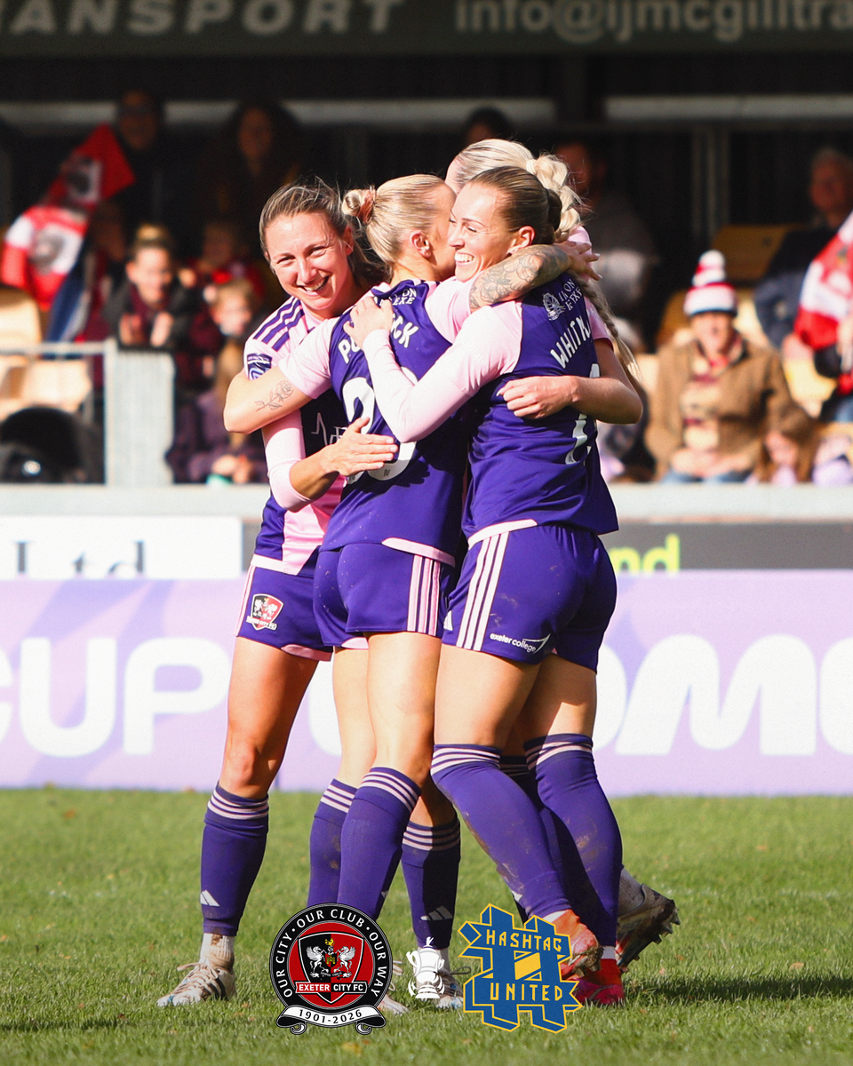 City women players celebrating their second goal