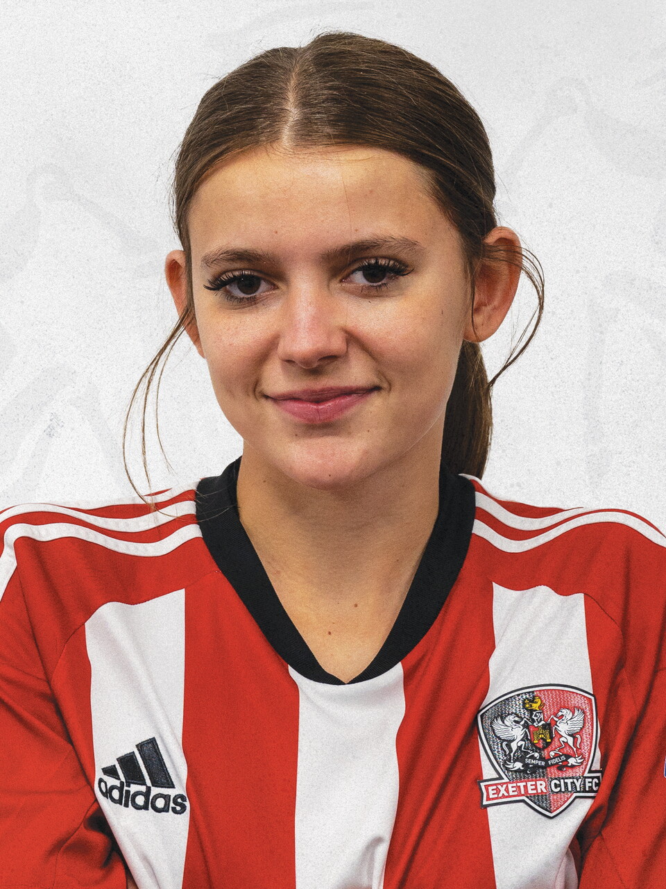 Kiera Harvey, in her red and white home shirt, head shot