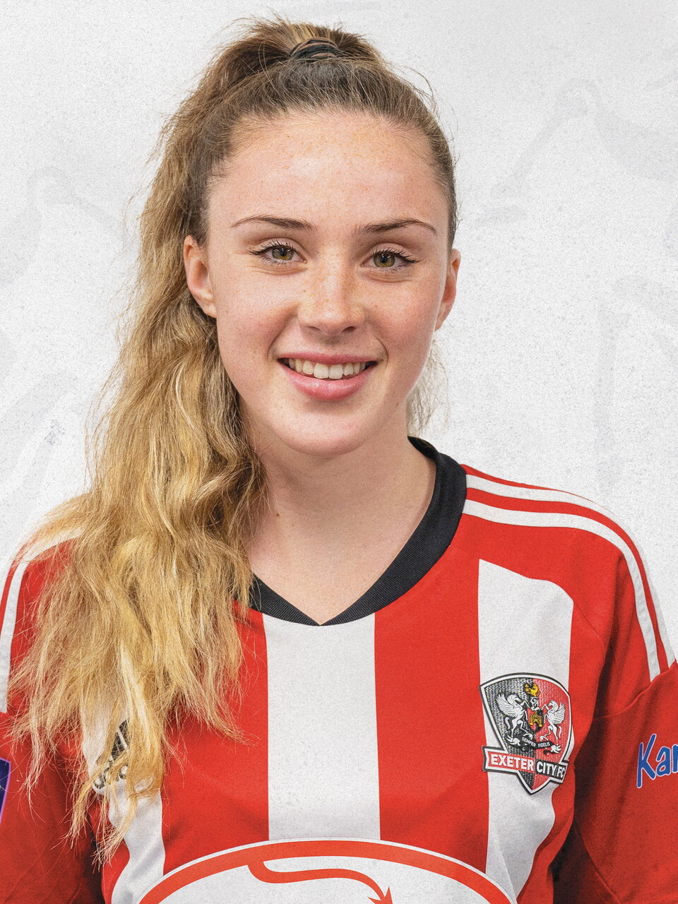 Profile picture for Paige MacDonald-Bale in her red and white home kit