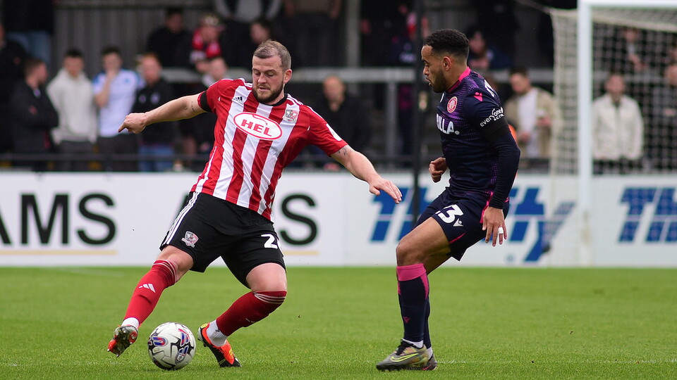 Pierce Sweeney battles a Stevenage player for the ball